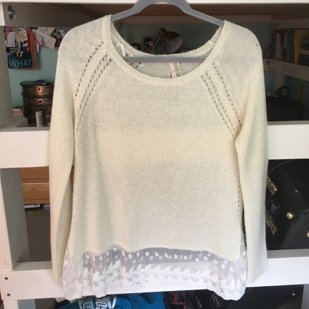 White sweater with lace detail